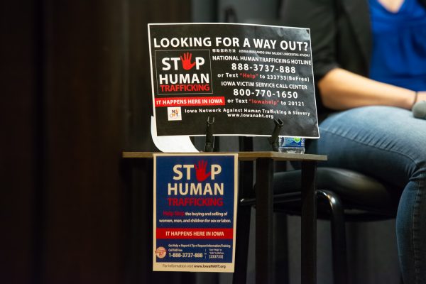 A poster sharing resources for victims of human trafficking during The Sex Trafficking Crisis In Iowa lecture at the Memorial Union, Ames, Iowa, Jan. 27, 2025.