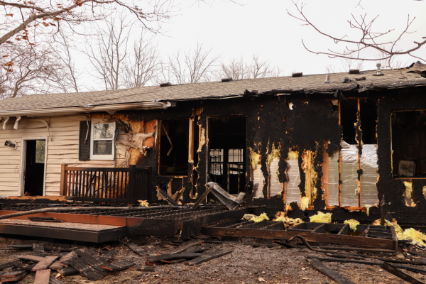 The burnt exterior of a home after firefighters put out the flames, Jan. 27, 2025, Ames, Iowa.