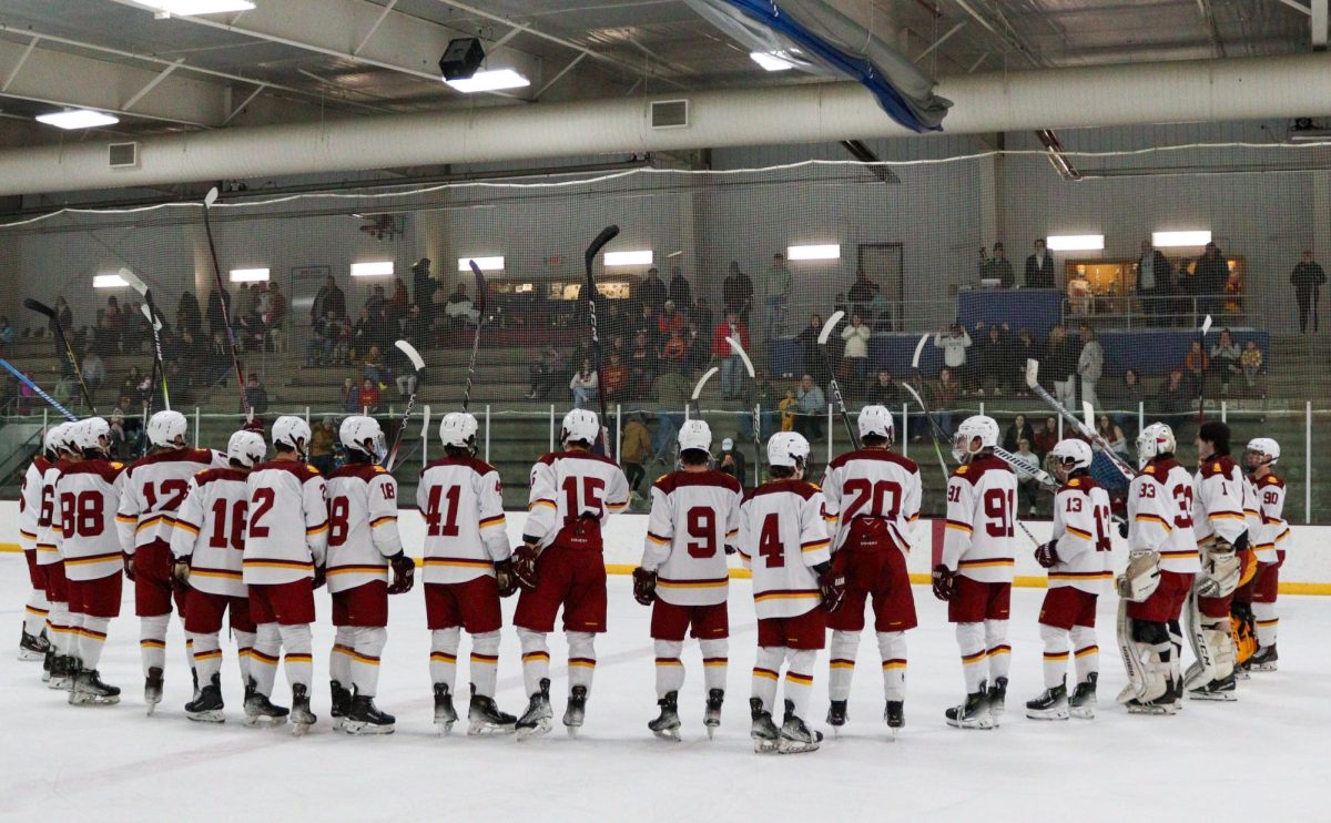 Iowa State men's hockey club traditional stick slap after game with Illinois State Redbirds. Ames Ice Arena, Jan. 31, 2025.