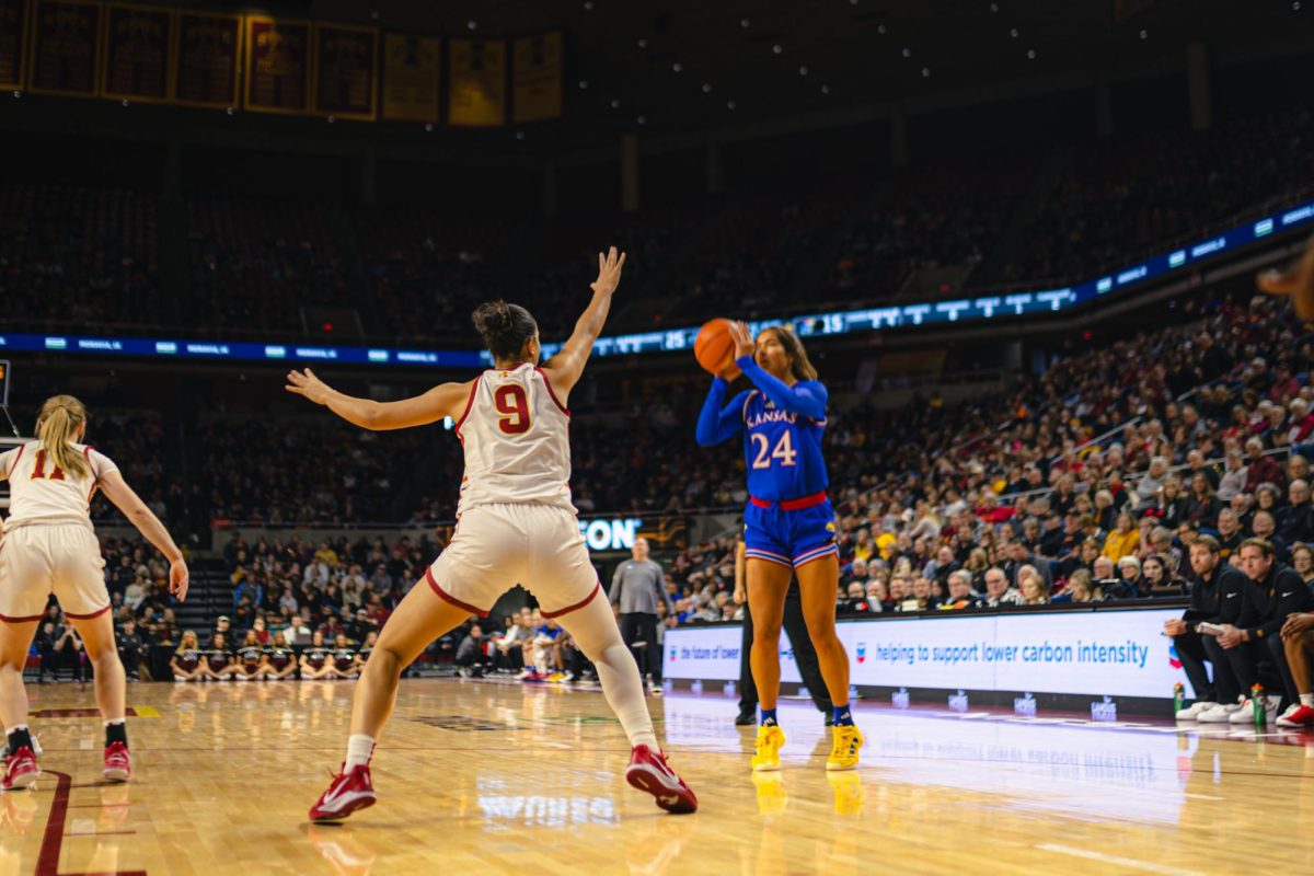 Lilly Taulelei (9) guards during the Iowa State vs. University of Kansas NCAA women's basketball game at Hilton Coliseum on Wednesday, Jan. 1, 2025, in Ames, Iowa.