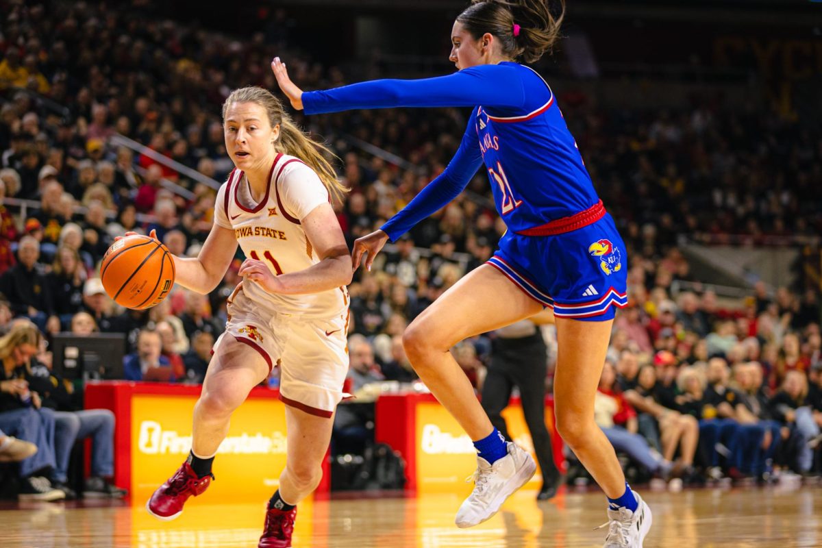 Emily Ryan (11) drives to the basket during the Iowa State vs. University of Kansas NCAA women's basketball game at Hilton Coliseum on Wednesday, Jan. 1, 2025, in Ames, Iowa.