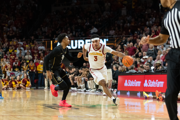 Tamin Lipsey (3) drives against the University of Central Florida, Jan. 21, 2025, Hilton Coliseum, Ames, Iowa.