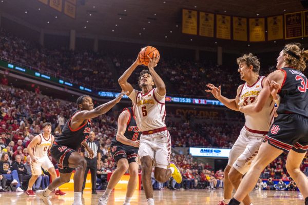 Curtis Jones (5) goes up for a layup during the second half of the Iowa State vs. University of Utah game in Hilton Coliseum in Ames, Iowa on Jan. 7, 2025.  