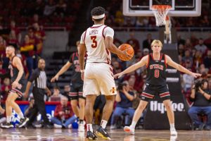 Tamin Lipsey (3) brings the ball up the court and waits for his opening during the first half of the Iowa State vs. University of Utah game in Hilton Coliseum in Ames, Iowa on Jan. 7, 2025.  