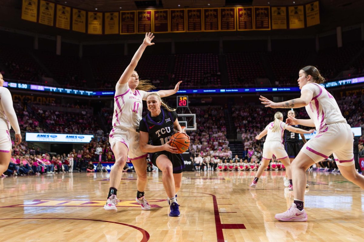 Emily Ryan (11) plays defense on TCU's Haley Van Lith (10) during the game against Texas Christian University, Feb. 2, 2025, Hilton Coliseum, Ames, Iowa.