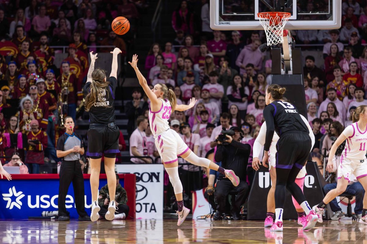 Kelsey Joens closes out on TCU's Madison Conner (2) during the game against Texas Christian University, Feb. 2, 2025, Hilton Coliseum, Ames, Iowa.