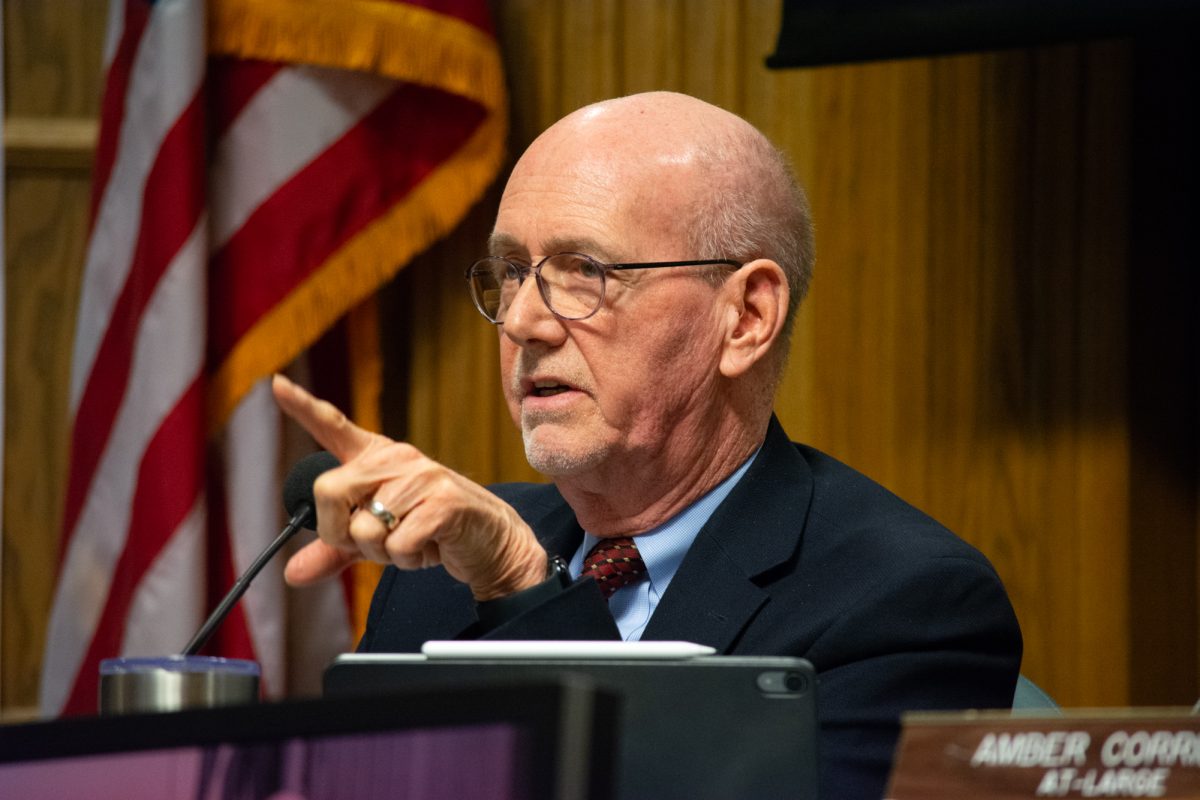 Mayor John Haila asks a clarifying question during the discussion of possibly passing an ordinance banning camping on public property in Ames during the City Council Meeting on Feb. 25, 2025, Ames City Hall, Ames, Iowa.