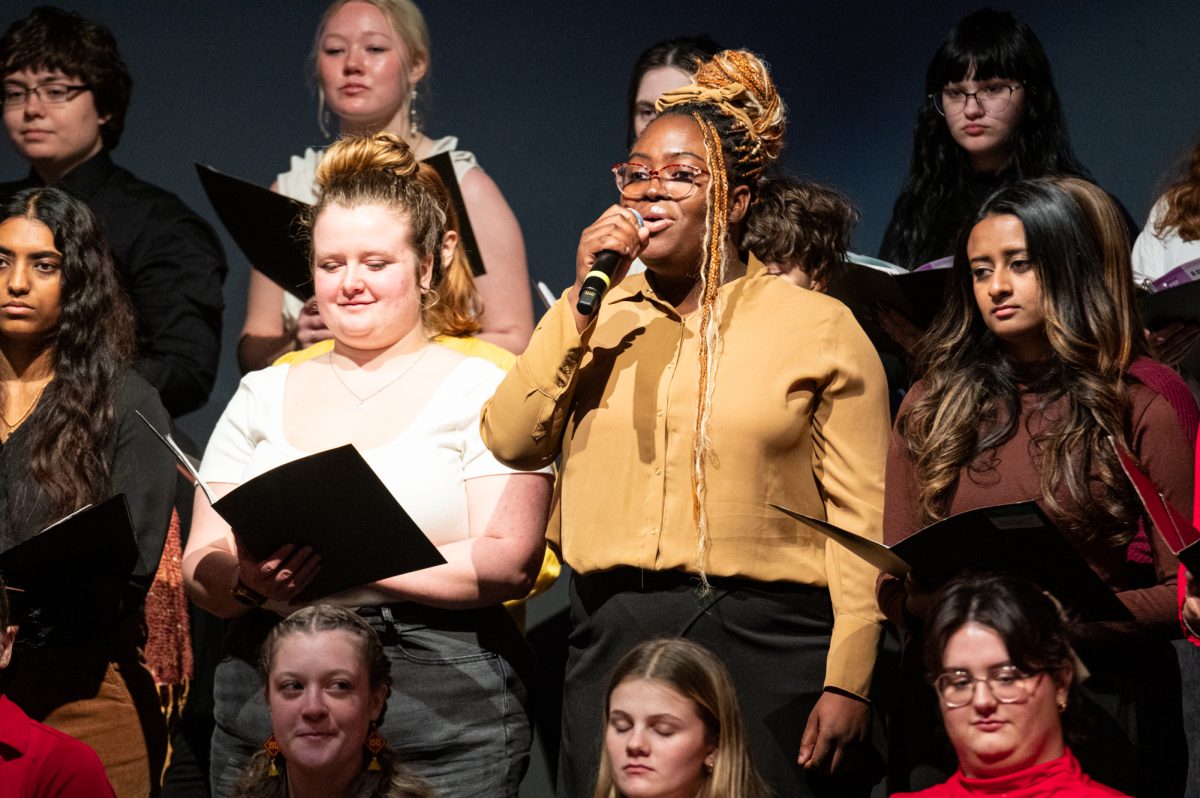 Odosa Amadasun sings a solo in "Change is Gonna Come" during the George Washington Carver Day In Iowa, Feb. 3, 2025, Memorial Union, Ames, Iowa.