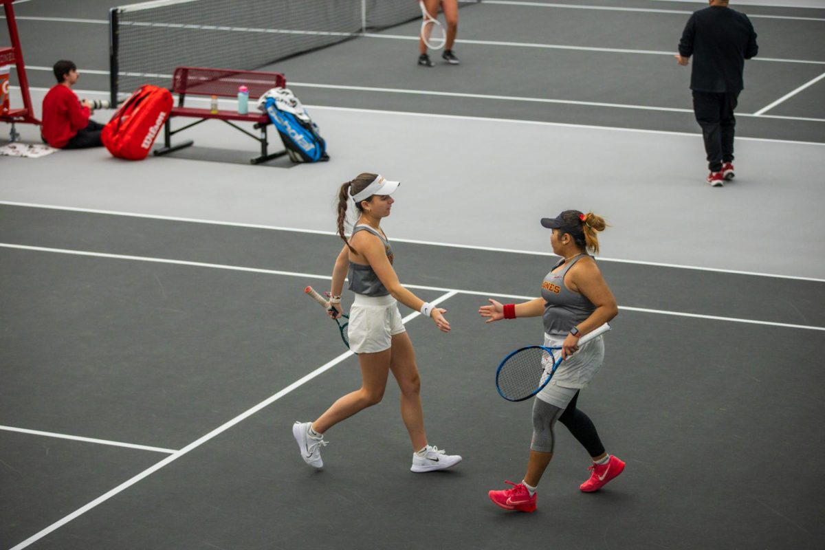 Anna Supapitch Kuearum and Christina Ramos Sierra during the Iowa State University vs. University of Wyoming tennis meet, Feb. 8, 2025, Iowa State Tennis Center, Ames, Iowa. 