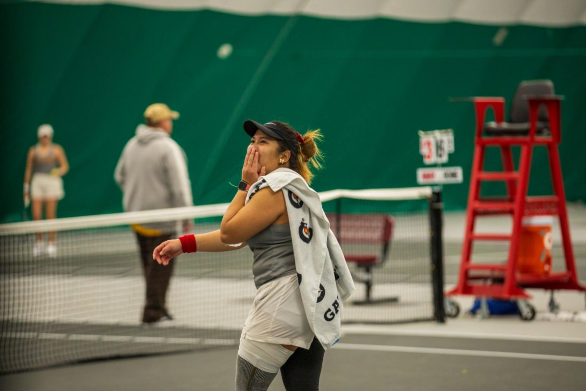 Anna Supapitch kuearum during the Iowa State University vs. University of Wyoming tennis meet, Feb. 8, 2025, Iowa State Tennis Center, Ames, Iowa. 