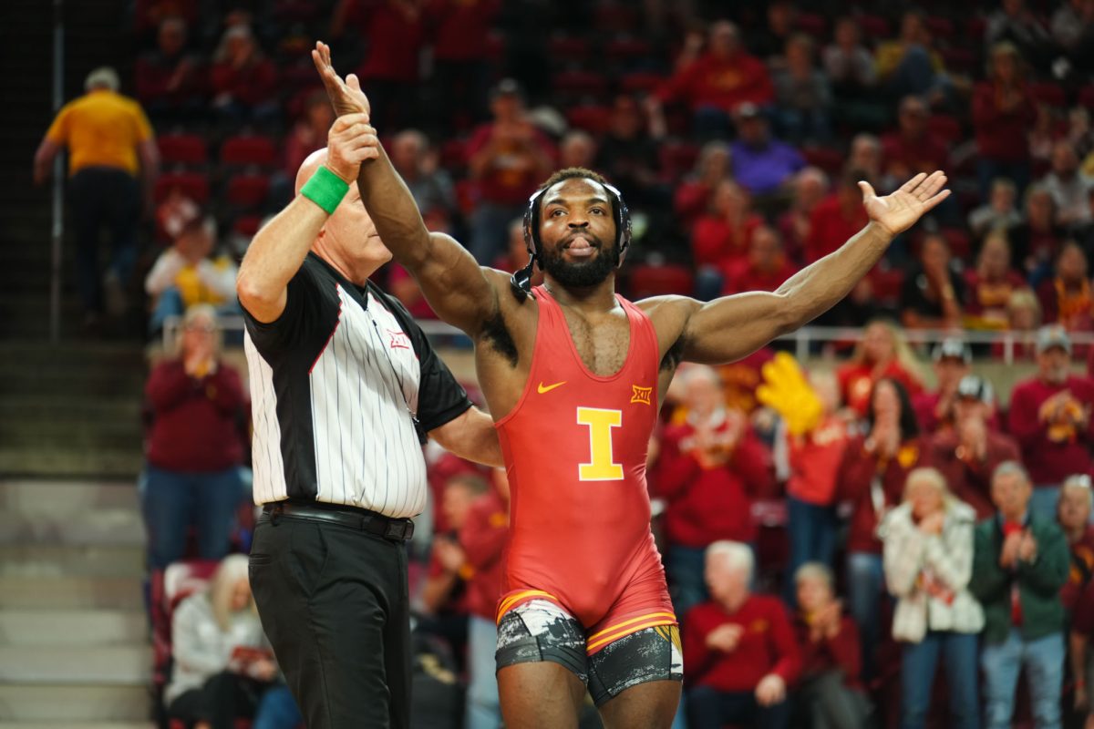 Paniro Johnson wins his match, Iowa State University vs. Arizona State University wrestling meet, Feb. 7, 2025, Hilton Coliseum, Ames, Iowa.