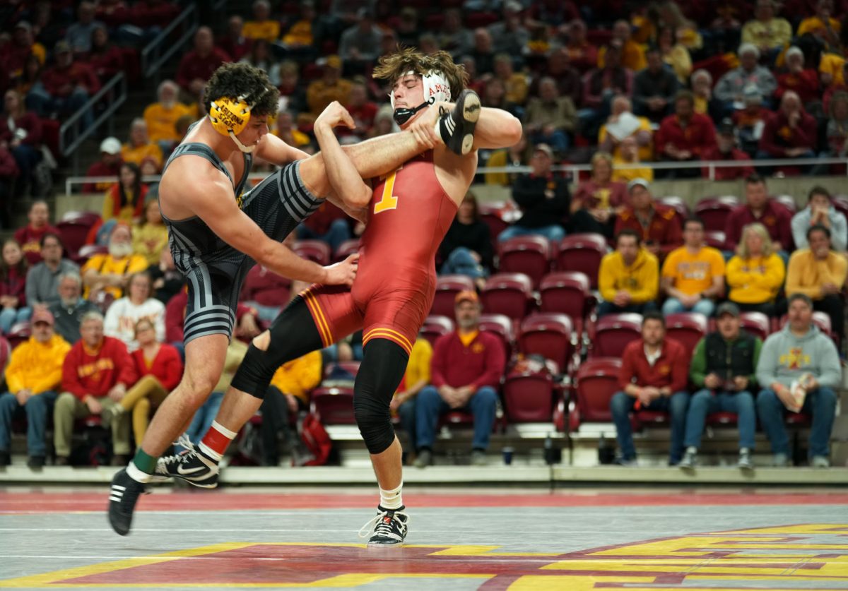 MJ Gaitan gets a hold of his opponent, Iowa State University vs. Arizona State University wrestling meet, Feb. 7, 2025, Hilton Coliseum, Ames, Iowa.