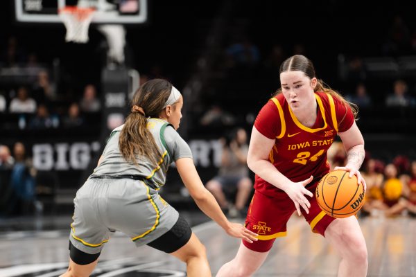 Addy Brown (24) looks for an opening on the court at the Iowa State University vs. Baylor University Big 12 tournament women's basketball game, T-Mobile Center, Kansas City, Missouri, March 7, 2025.