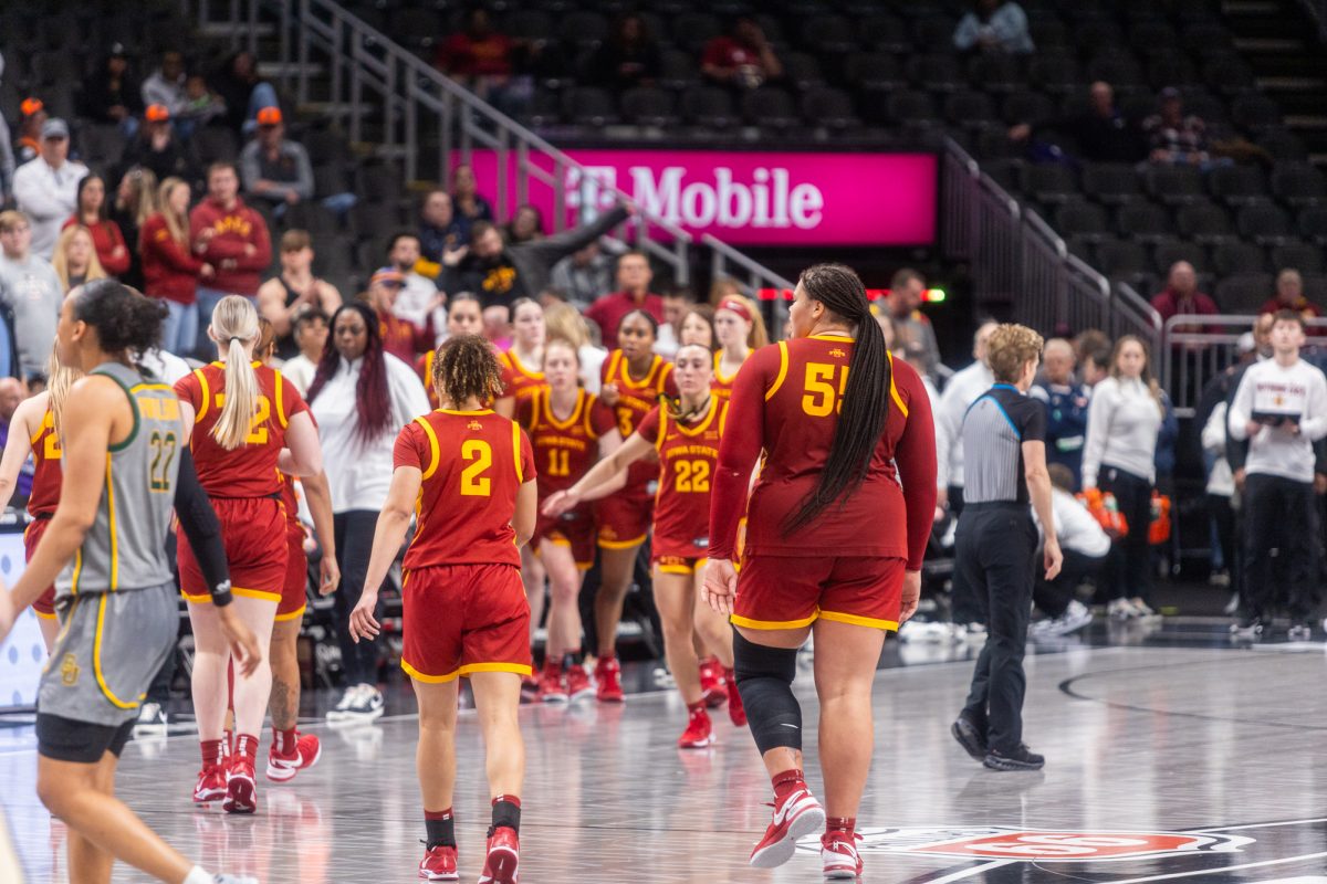 Audi Crooks (55) and Arianna Jackson (2) walk towards the bench after the game at the Iowa State University vs. Baylor University Big 12 tournament women's basketball game, T-Mobile Center, Kansas City, Missouri, March 7, 2025.