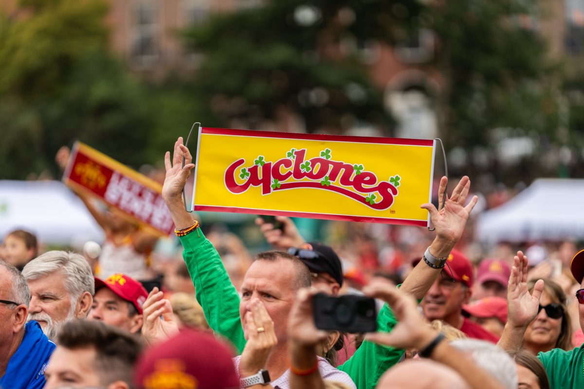 Fans hold up a 'Cyclones" sign at the Iowa State Pep Rally in Merrion Square Park, Dublin, Ireland, Aug. 22, 2025. 