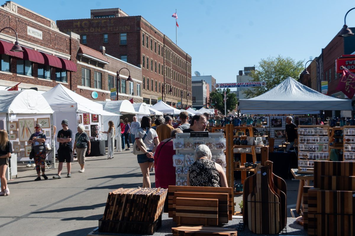 Many people visit the Octagon Art Festival, Main Street, Ames, Iowa, Sept. 28, 2025.