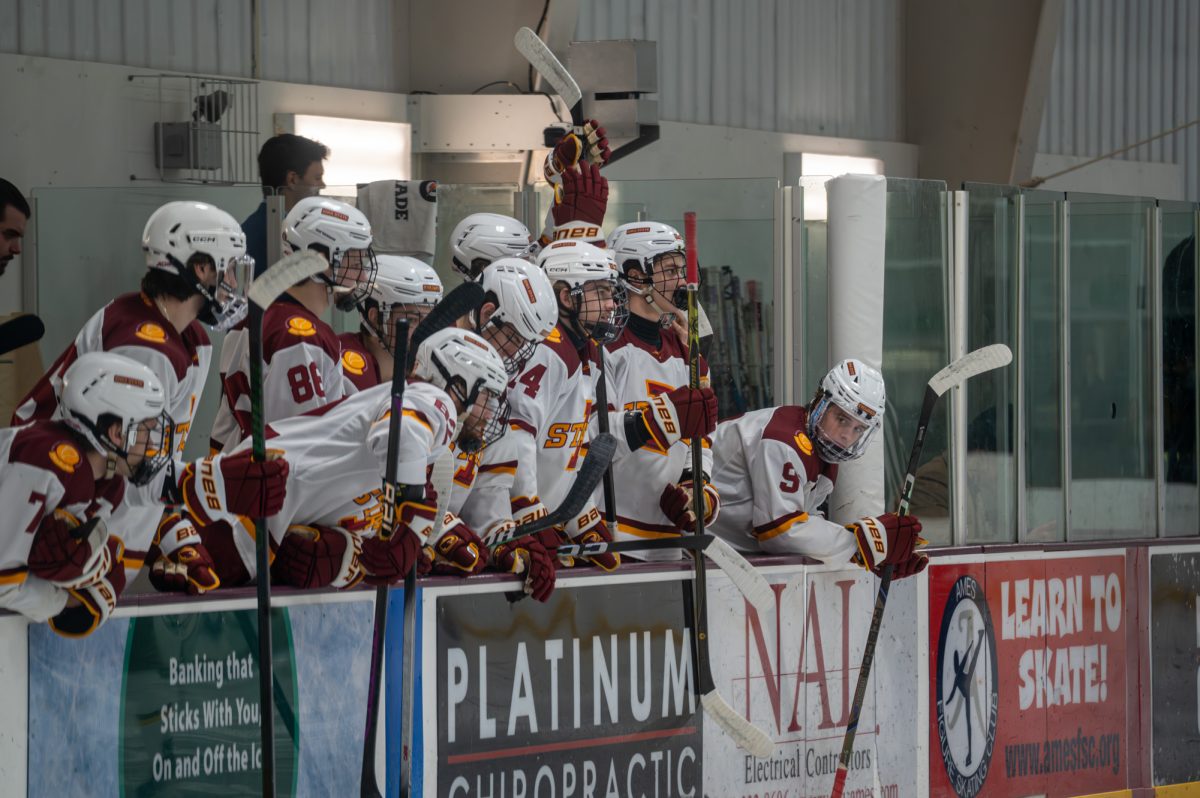 The Iowa State University Men's Club Hockey team bang their sticks on the wall for the puck drop, starting off the last home game of the weekend, Ames Ice Arena, Ames, Iowa, Nov. 22, 2025.