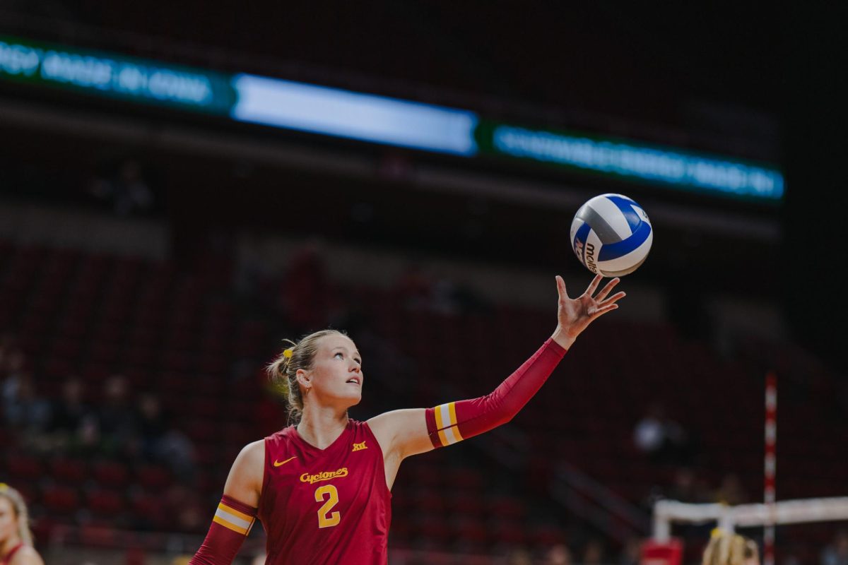 Morgan Brandt (2) catches a volleyball after one of the ball girls tosses it to her at Hilton Coliseum, Ames, Iowa, Nov. 29, 2025.