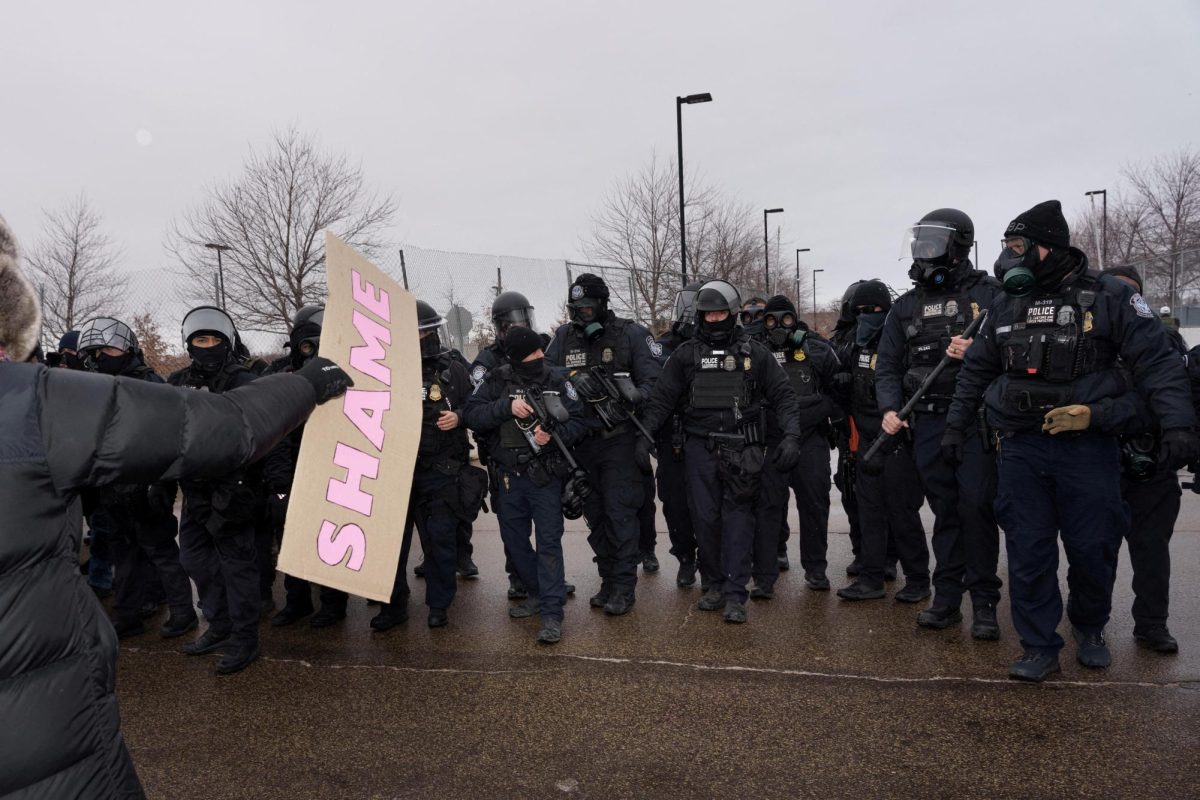 U.S. Customs and Border Protection (CBP) agents stand guard after clearing people from the street during a protest outside the Bishop Henry Whipple Federal Building, more than a week after a U.S. Immigration and Customs Enforcement (ICE) agent fatally shot Renee Nicole Good on January 7, in Minneapolis, Minnesota, U.S., January 16, 2026. REUTERS/Tim Evans