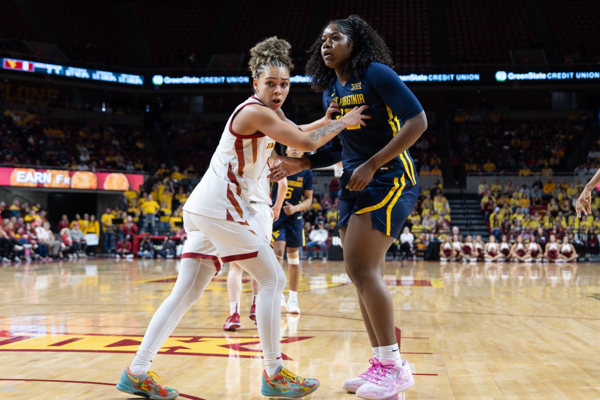 Jada Williams (8) covering a West Virginia player while the ball was being thrown in. Iowa State vs. West Virginia, Hilton Coliseum, Ames, Iowa, Jan. 11, 2026.