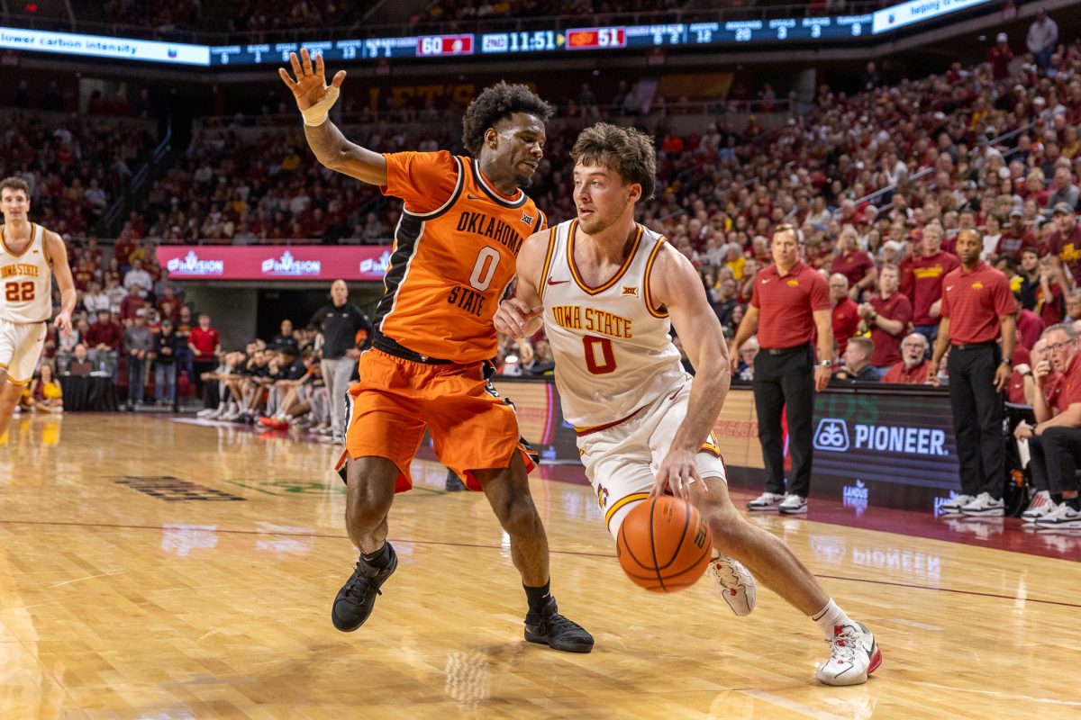 Nate Heise (0) drives into the paint for a lay-up during the men's basketball game vs. Oklahoma State in Hilton Coliseum in Ames, Iowa, Jan. 10, 2026.