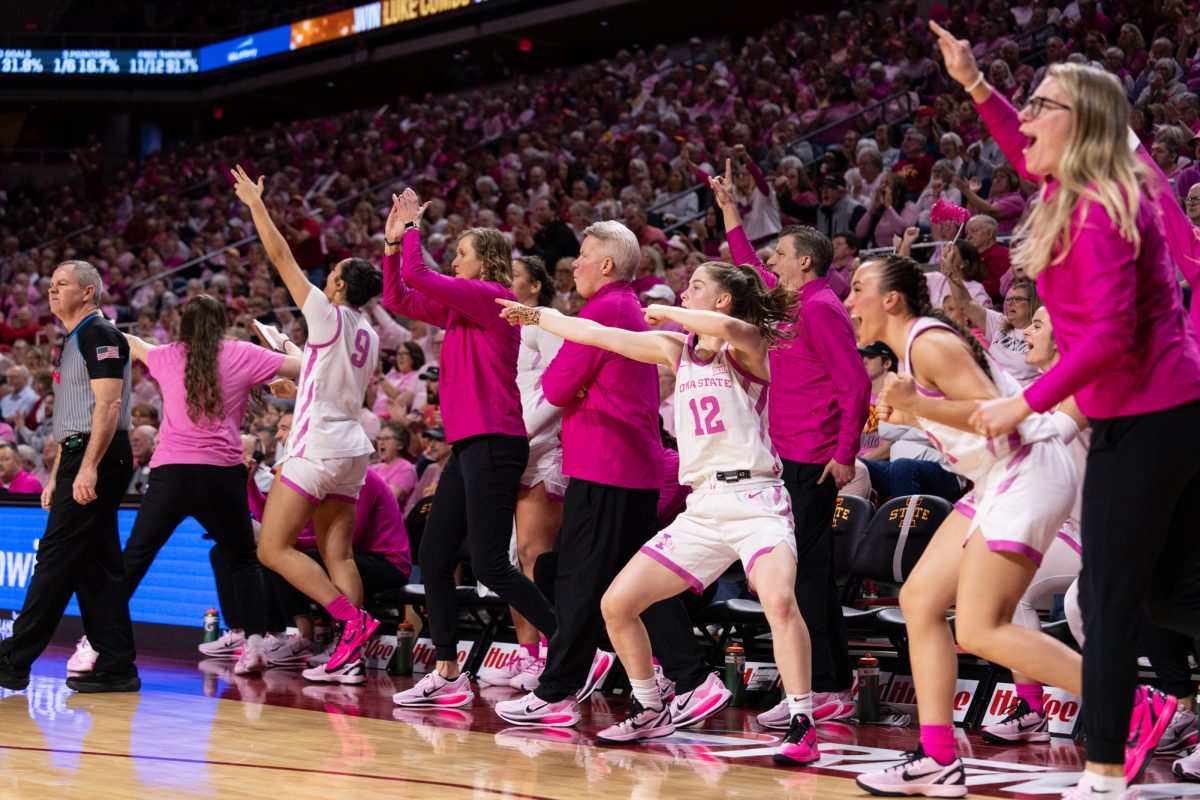 The Iowa State bench exploding with excitement after a Cyclone basket. Iowa State vs. Kansas State. Hilton Coliseum, Ames, Iowa, Feb. 15, 2026.