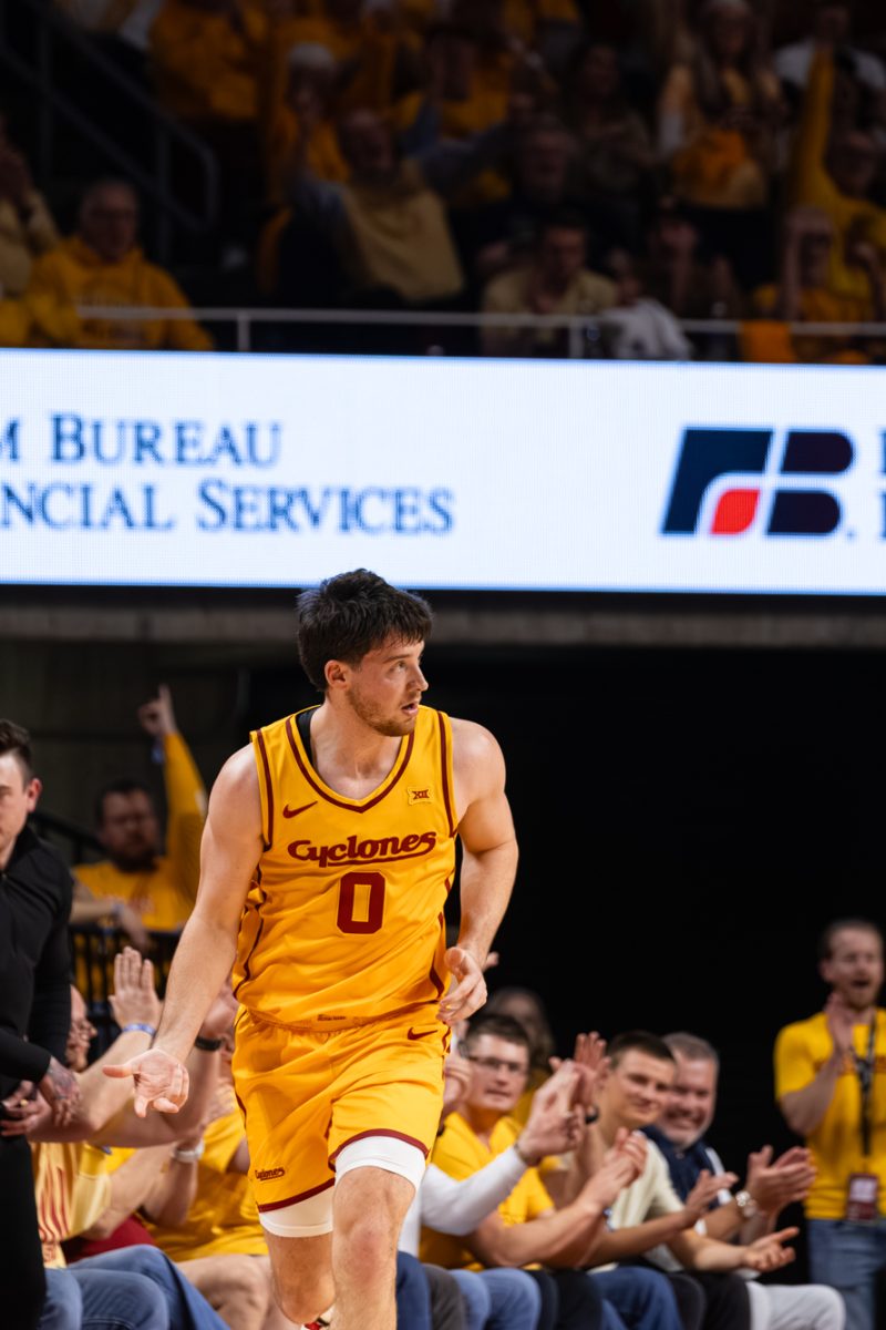 Nate Heise (0) celebrates a three-pointer during the Iowa State men’s basketball victory over Houston, 70-67, at Hilton Coliseum in Ames, Iowa, on Feb. 16, 2026.