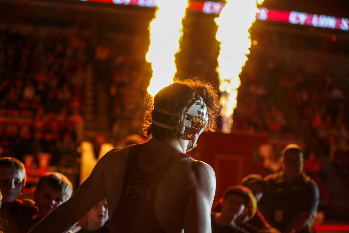 Vinny Zerban walking out for match, Iowa State University vs. University of West Virginia wrestling meet, Feb. 13, 2026, Hilton Coliseum, Ames, Iowa.