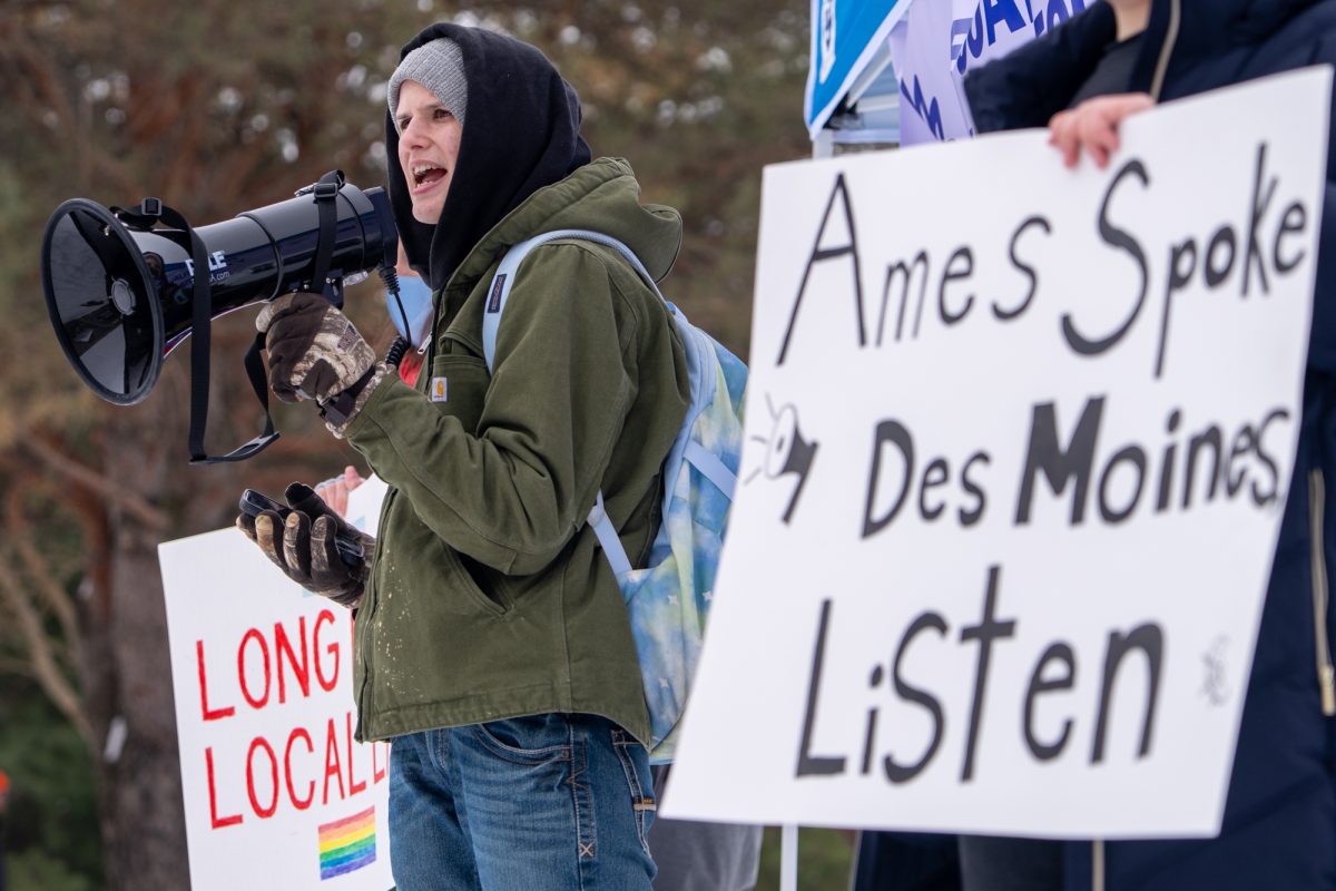 Iowa State student Silvera Dudenhoefer leads chants during a demonstration against House File 2541 at parks Library in Ames, Iowa, Feb. 24, 2026.