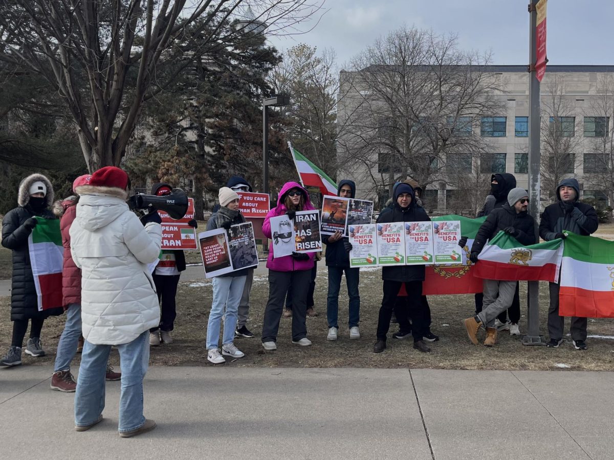 Iranian Students' and Scholars' Association and ISU students protest outside Parks Library Jan. 30 to raise awareness about ongoing unrest and human rights concerns in Iran. 