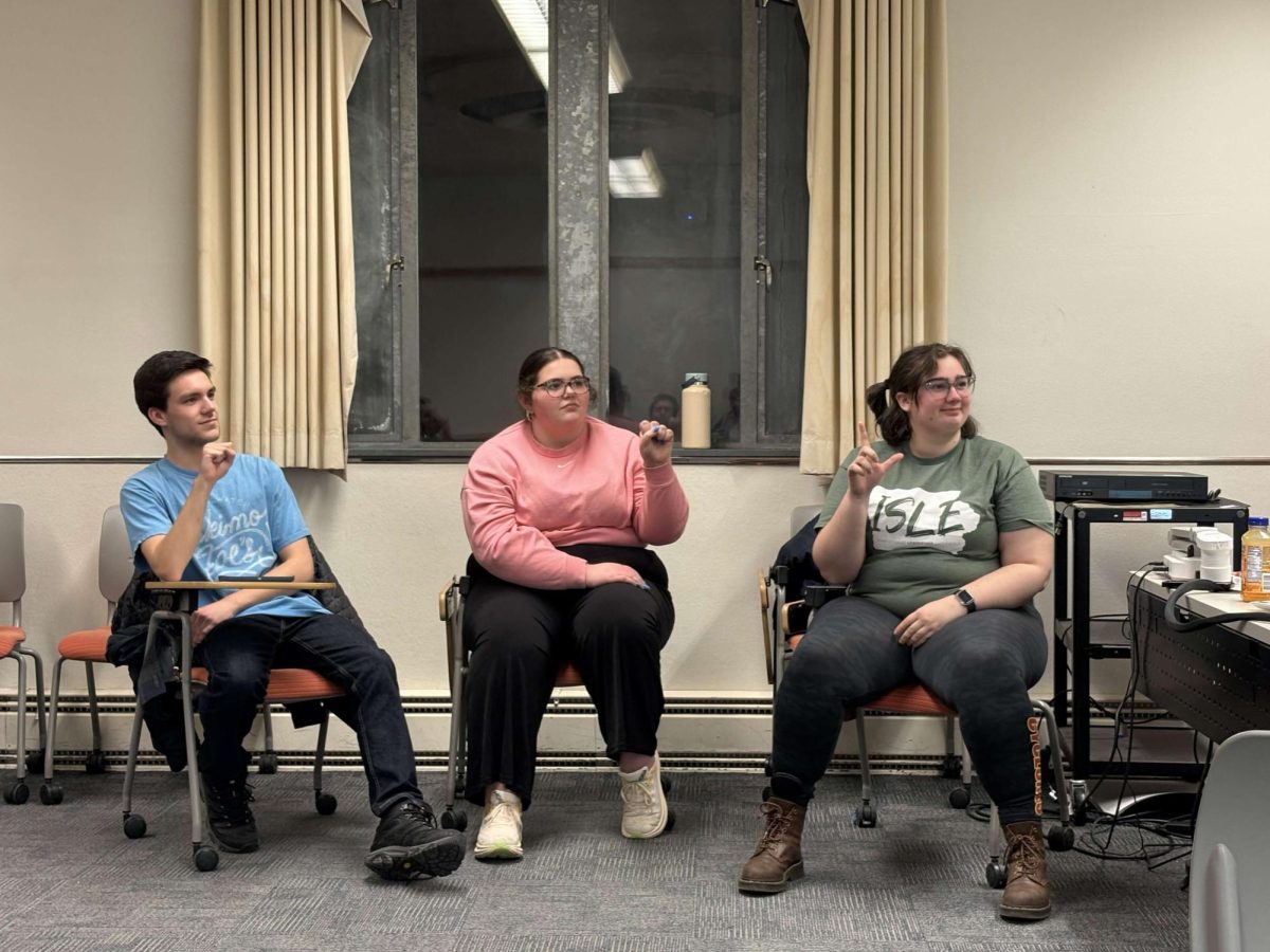 Members of the ASL Club practicing their signing at their meeting Feb 4. 