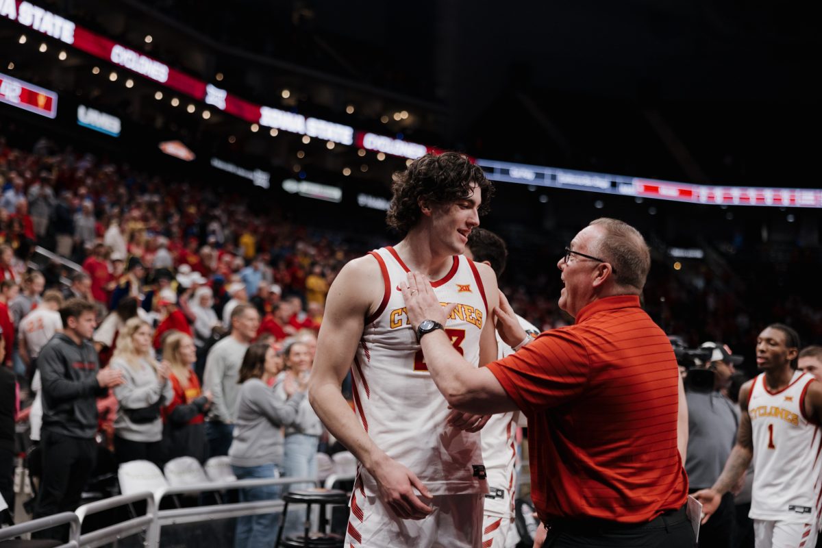 Blake Buchanan (23) and Iowa State Assistant Coach Kyle Green after the Arizona State vs. Iowa State men's basketball game at the Big 12 basketball tournament, Kansas City, Missouri, March 11, 2026.