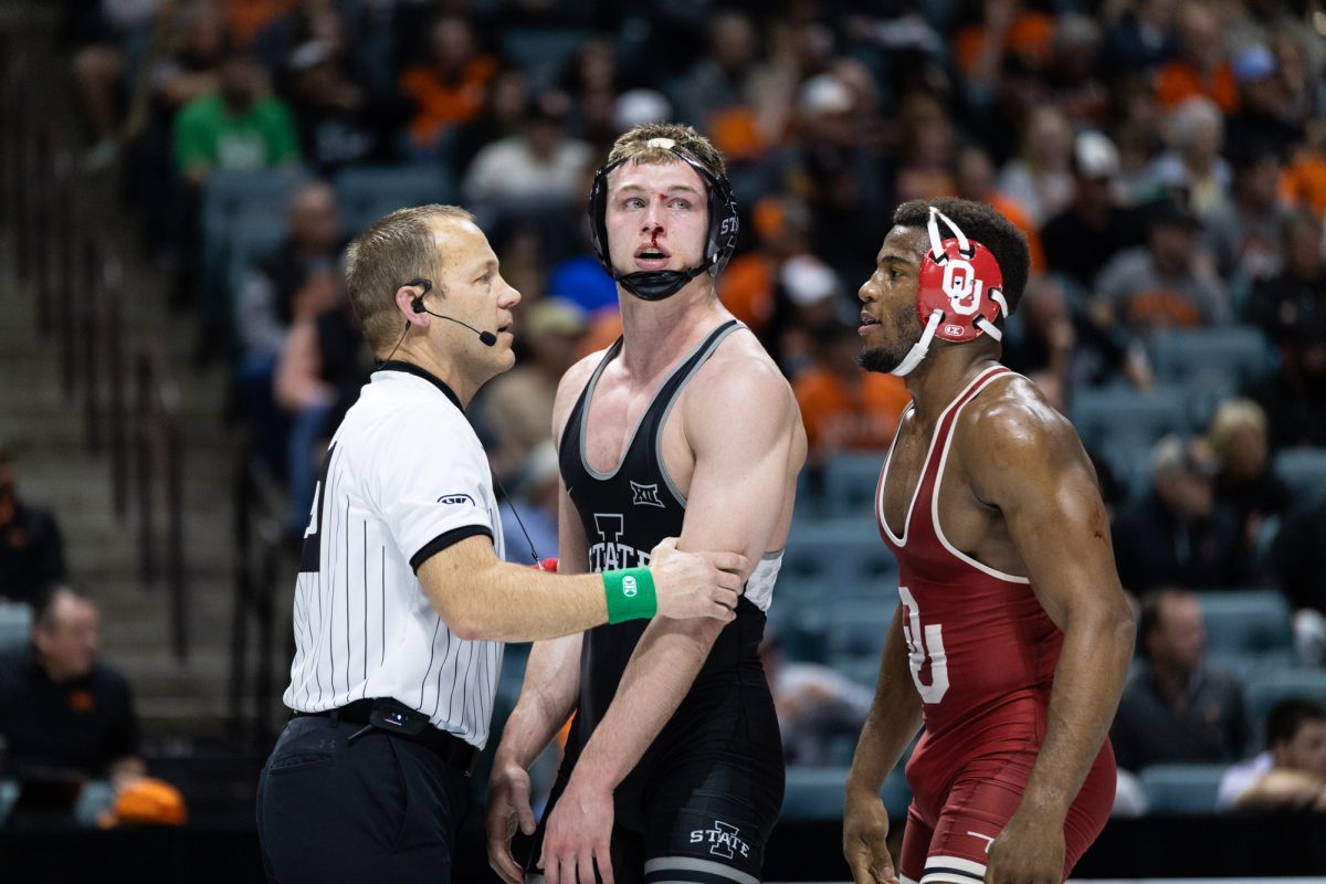 Rocky Elam with a bloody face after his duel with DJ Parker (Oklahoma). Big 12 Wrestling tournament, session two, BOK Center, Tulsa, Oklahoma, March 6, 2026.