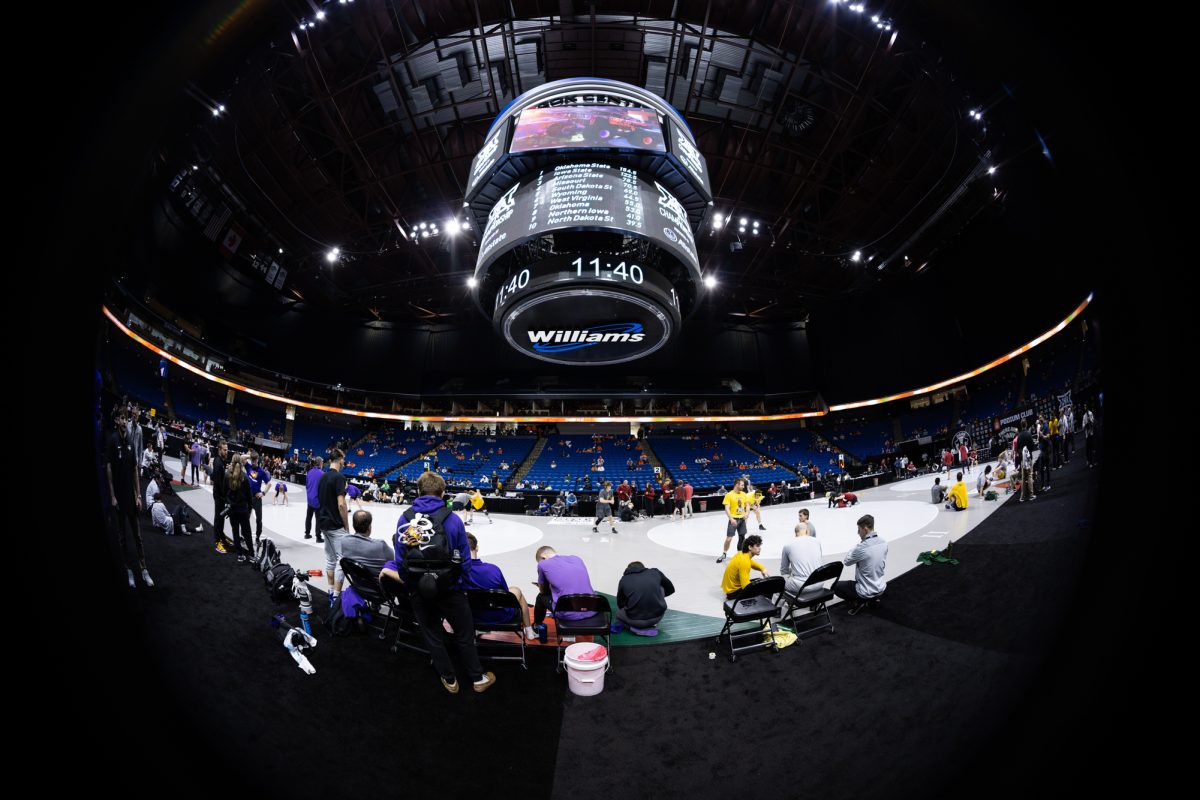 Athletes warm up before session three. Big 12 Wrestling Tournament, session three, BOK Center, Tulsa, Oklahoma, March 7, 2026.