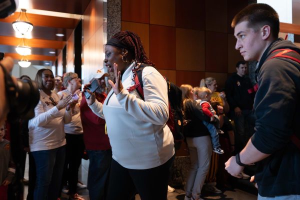 Assistant coach, Latoja Schaben, smiles and waves at the Iowa State team send-off at Marriott Downtown, Kansas City, Missouri, March 5, 2026.