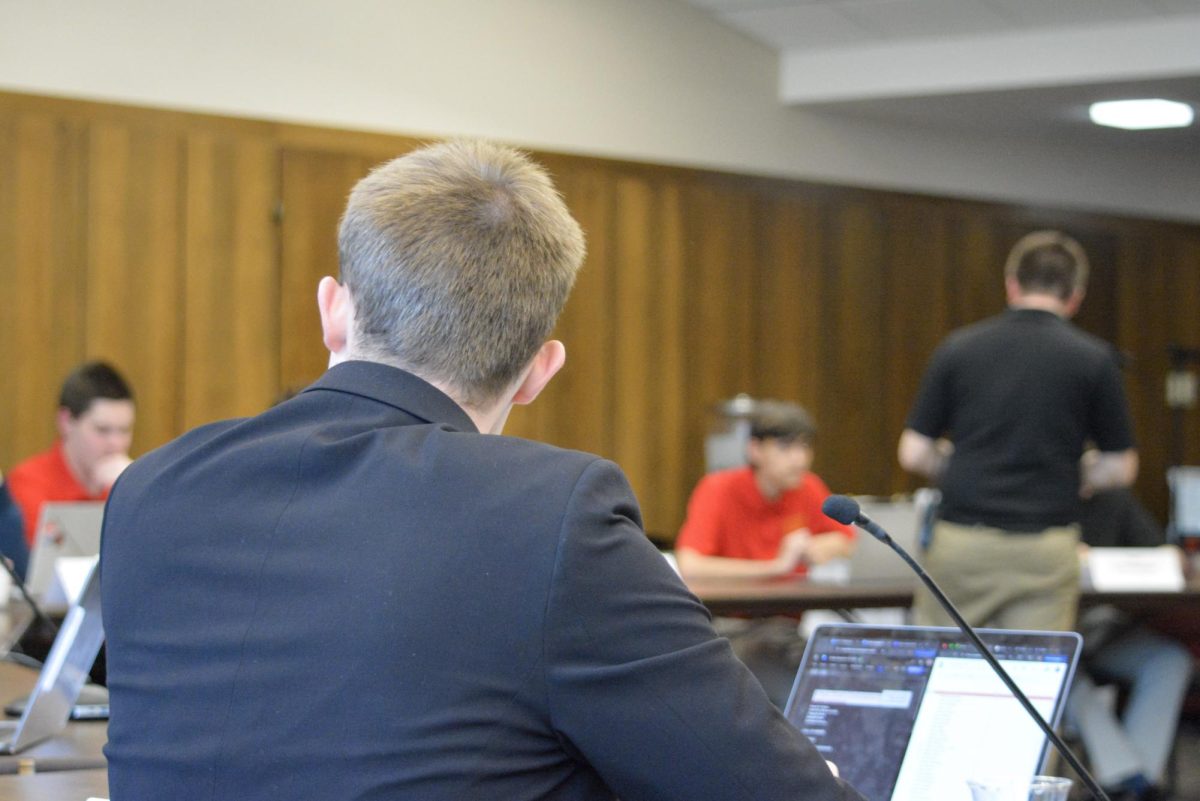 Student Government member at the student government meeting inside the Memorial Union Campanile room, Ames, Iowa, April 15th, 2026.