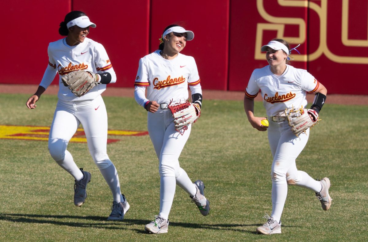 The outfielders run to the dugout at the end of the inning against Oklahoma State at Cyclone Sports Complex, Ames, Iowa, April 10, 2026. 