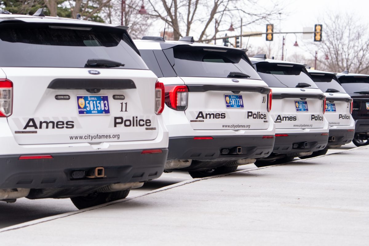Ames Police Department vehicles parked outside of Ames City Hall in Ames, Iowa, April 6, 2026.