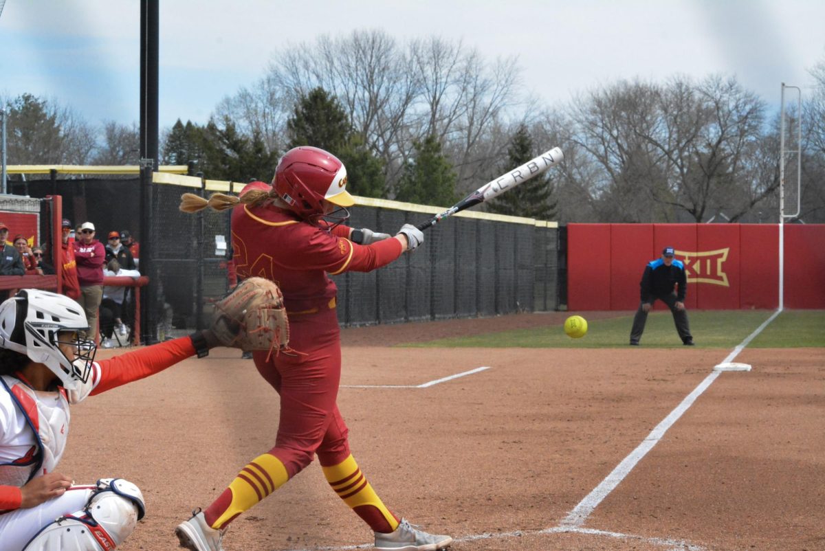 Reagan Bartholomew (24) hitting the ball at bat during the Iowa State vs. Arizona softball game at Cyclone Sports Complex, Ames, Iowa, April 6, 2026. 