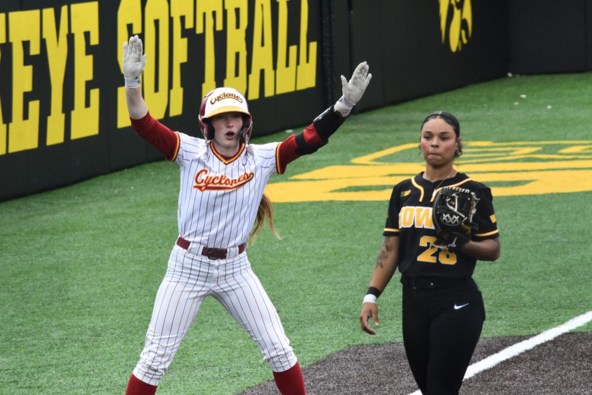 Karlee Ford (9) celebrating after sliding into base during the Iowa State vs. Iowa softball game at Bob Pearl Softball Field, Iowa City, Iowa, April 8, 2026.