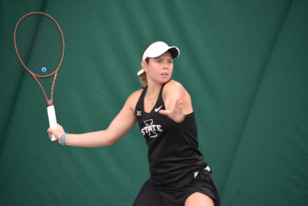Ashlee Narker about to hit the ball during the Iowa State vs. Cincinnati Tennis Match, Ames Fitness Center, Ames, Iowa, April 3 2026