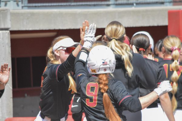 Karlee Ford (9) high fiving Reagan Bartholomew (24) during the Iowa State vs. No. 22 UCF softball game at Cyclone Sports Complex, Ames, Iowa, May 2, 2026.