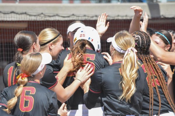 Cyclone team congratulating Sydney Malott (25) during the Iowa State vs. No. 22 UCF softball game at Cyclone Sports Complex, Ames, Iowa, May 2, 2026.