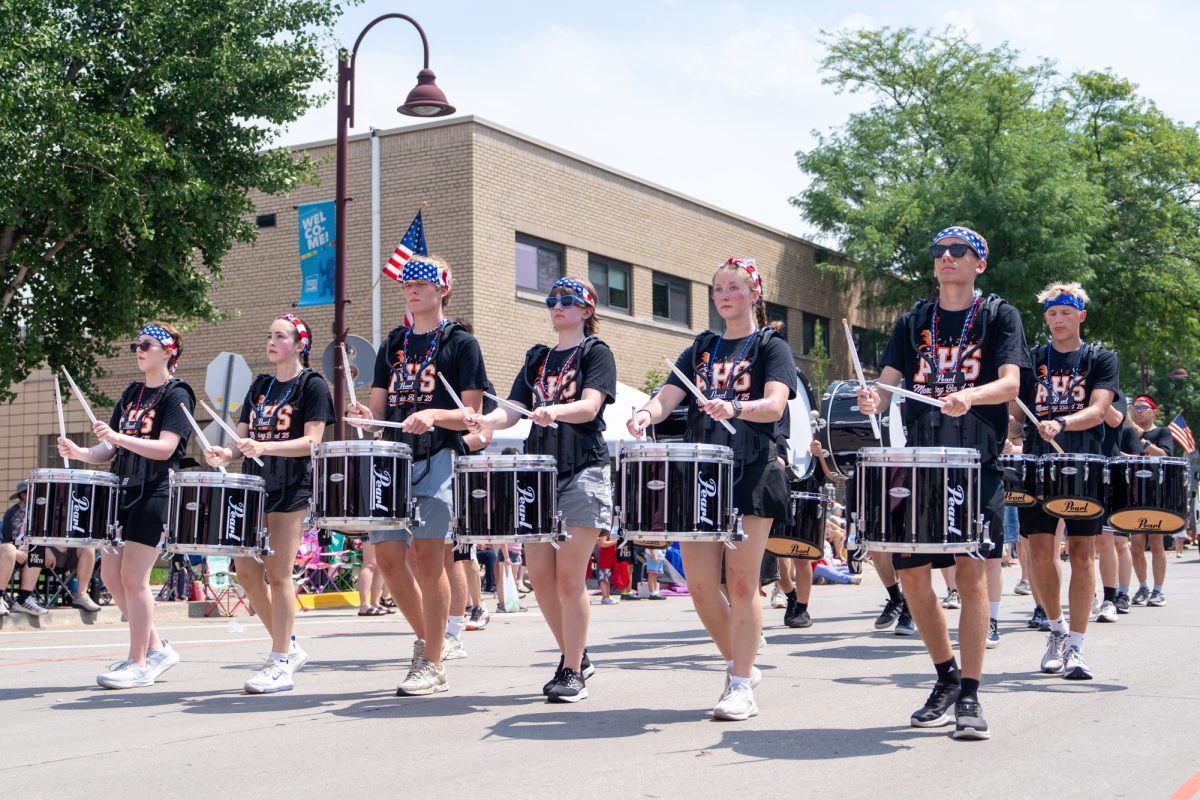 The Ames High School drumline at the Ames Fourth of July parade in downtown Ames, Iowa, July 4, 2026.